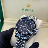 Rolex submariner silver with black rotating dial with date
