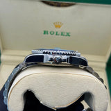 Rolex submariner silver with green rotating dial with date